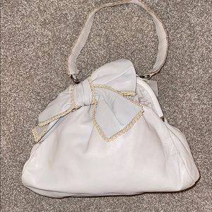 Rada Italy pearl bow small leather clutch bag